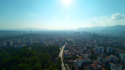 Aerial View of Bustling Cityscape with Green Trees