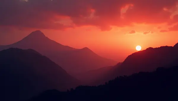 Black Mountain Ranges Silhouetted At Sunset