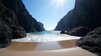 Black Volcanic Rock Formations On Sandy Beach