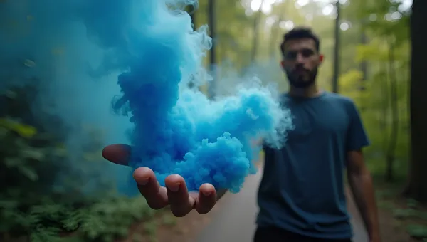 Blue Ash Smoke Swirling Around Hand Outdoors