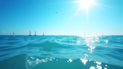 Blue Ocean Waves With Sailboats Under Sunny Sky