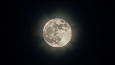 Bright Full Moon Illuminating Dark Night Sky