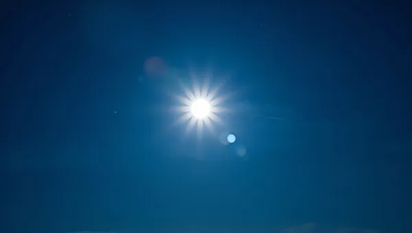 Bright Full Moon Over Deep Blue Sky