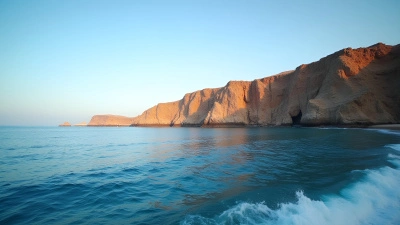 Brown Rocky Cliffs Over Calm Blue Ocean