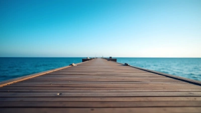 Brown Wooden Boardwalk Along Calm Sea