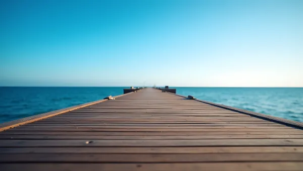 Brown Wooden Boardwalk Along Calm Sea