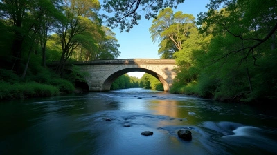 Calm River Beneath Stone Bridge With Greenery