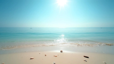 Calm Shoreline With Clear Blue Water And Sandy Beach