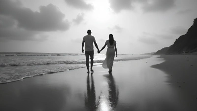 Couple Walking Hand in Hand on Sandy Beach