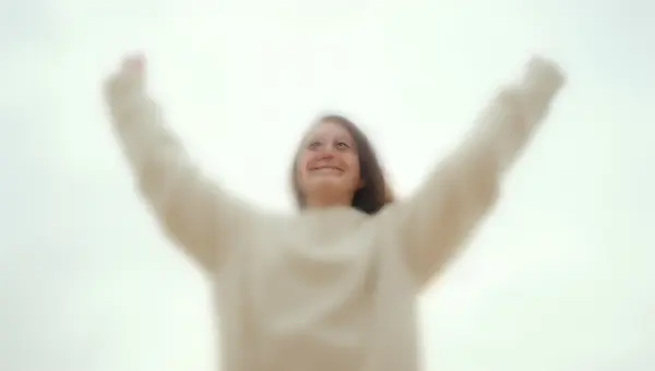 Cozy White Sweater Person Raising Hands Joyfully