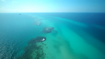 Expansive Turquoise Sea Aerial View With Coastal Details
