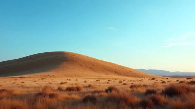 Gently Sloping Brown Hill Under Blue Sky