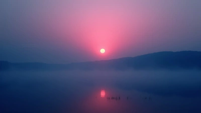Glowing Full Moon Over Misty Dawn Landscape