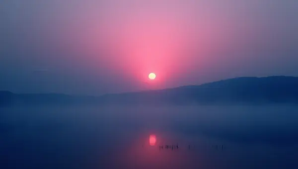 Glowing Full Moon Over Misty Dawn Landscape