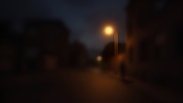 A softly blurred nighttime photo of a glowing street light casting warm light against a dark urban backdrop