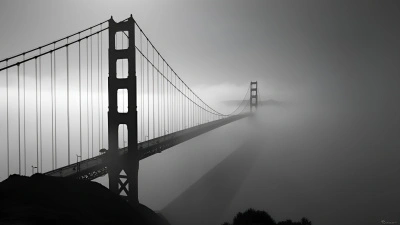 Golden Gate Bridge In Fog With Moody Sky
