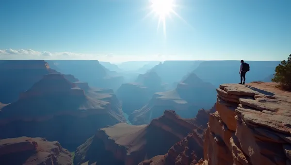 Grand Canyon Hiker On Rocky Ledge Under Blue Sky