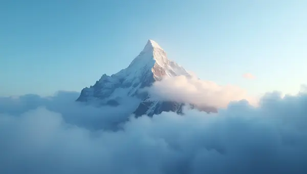 Majestic Mountain Peak with Morning Clouds