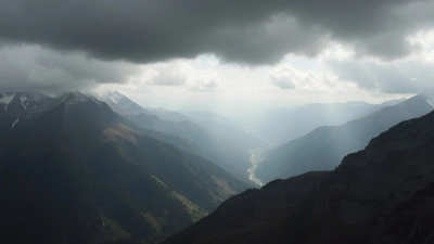 Monochrome Mountain Range Under Overcast Sky