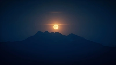 Mountain Range Silhouette Beneath Full Moon