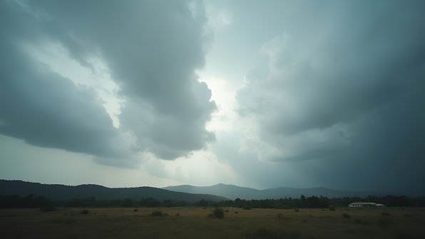 Overcast sky with gray clouds casting soft diffused light over a tranquil landscape