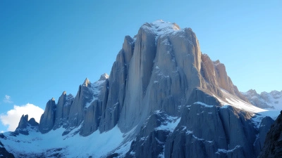 Rocky Mountain With Snow Under Blue Sky