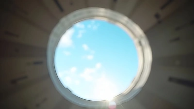 Round Window Frame View Of Blue Sky