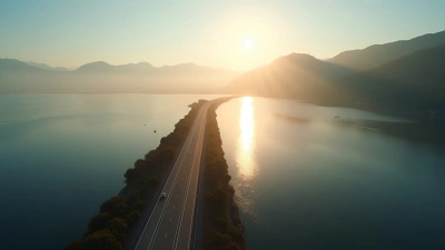 Scenic Roadway Above Calm Water At Golden Hour