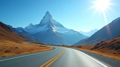 Scenic Roadway Along Snow-Capped Mountain View