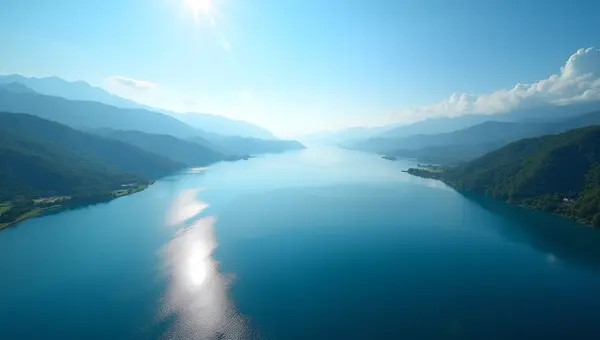 Serene Lake Reflecting Blue Sky and Greenery