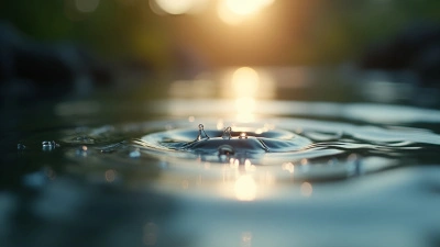 Shimmering Water Droplets On Calm Reflective Surface