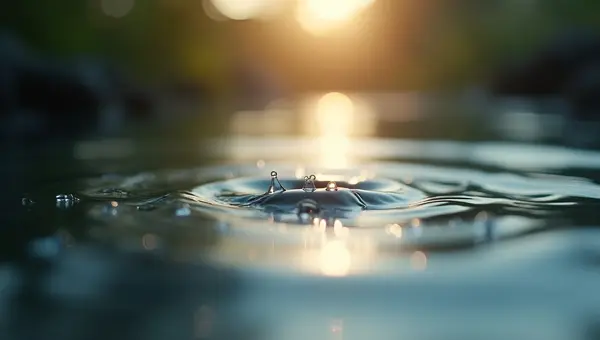 Shimmering Water Droplets On Calm Reflective Surface
