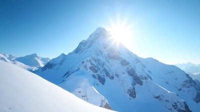 Snow-Covered Mountain Peak Under Bright Sunlight
