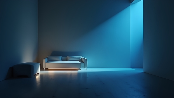 A dark room illuminated by soft white and blue ambient lighting highlighting minimalist modern furniture