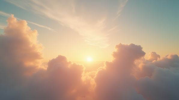 Soft white clouds illuminated by warm golden hour sunlight against a vibrant sky
