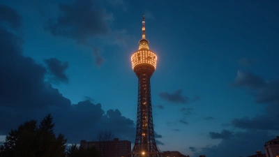 Towering Structure With Bright Lights At Twilight