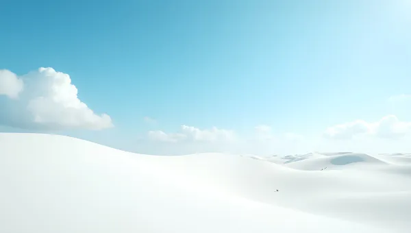 White Sand Dunes Under Clear Blue Sky
