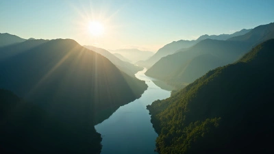 Winding River Through Green Mountains at Sunrise