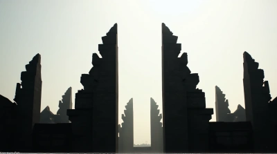 Ancient Stone Towers Against Pale Sky