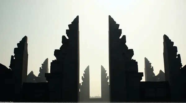 Ancient Stone Towers Against Pale Sky