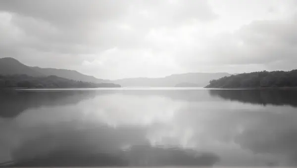 Black And White Lake Reflection With Cloudy Sky
