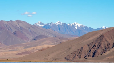Brown Mountain Range Under Clear Blue Sky