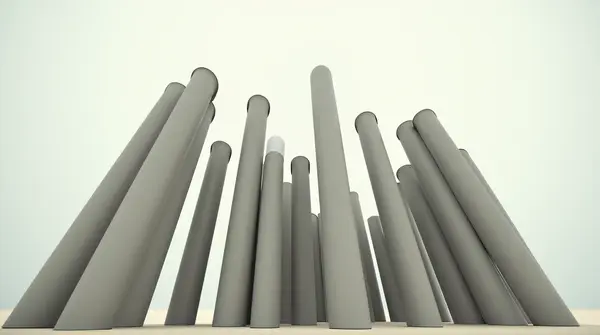 Low-angle view of smooth cylindrical trunks rising against a pale sky