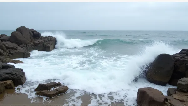 Coastal Waves Breaking On Rocky Shoreline