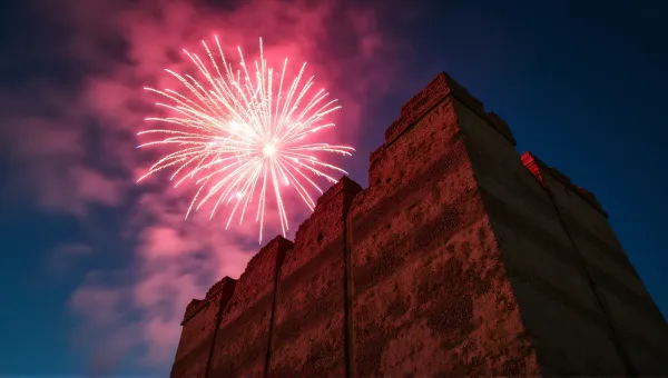 Colorful Fireworks Above Brown Concrete Structure