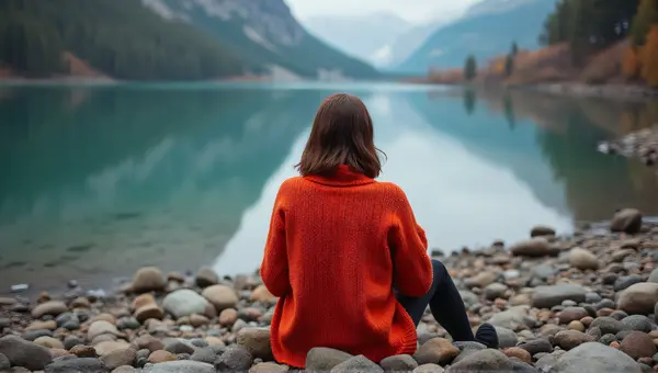 Colorful Sweater By Reflective Lake Shoreline