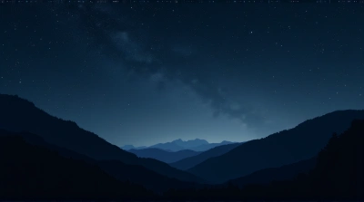Dark Ridges Against Expansive Starry Sky