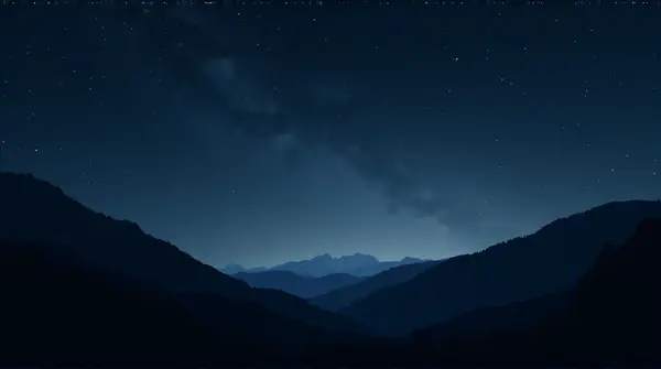 Dark ridgelines outlined against a wide star-filled sky with twinkling lights and a low horizon.
