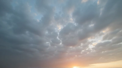 Dense Overcast Sky At Twilight With Warm Light