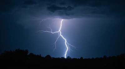 Electric Lightning Bolt Illuminating Twilight Landscape